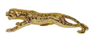 Gold panther figurine on a white background